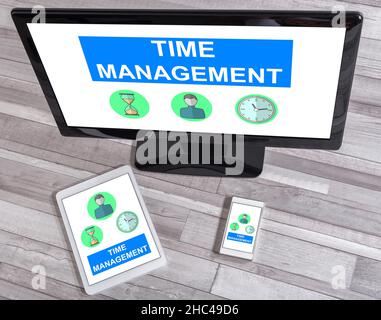 Time management concept shown on different information technology devices Stock Photo
