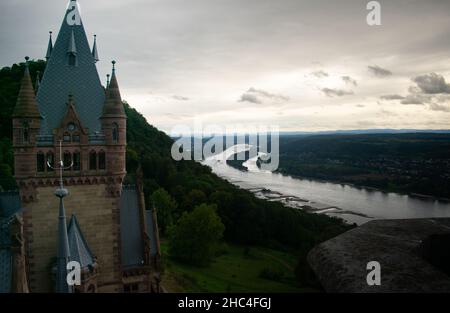 Drachenburg Castle in Bonn, Germany with downtown city and shipping canal in the background Stock Photo