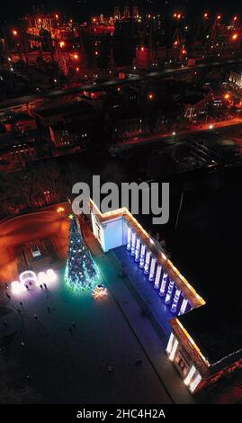 Verticalnight panorama of the main Christmas tree on Dumskaya square and sea port in Odessa Ukraine Stock Photo