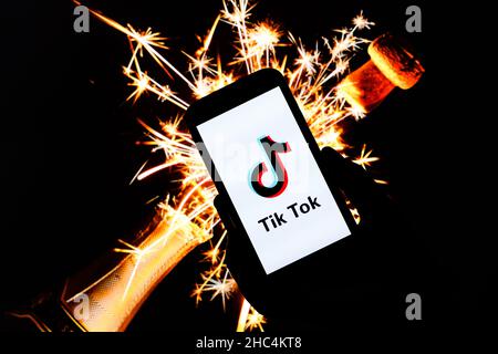 In this photo illustration, a Tik Tok logo is seen displayed on TV