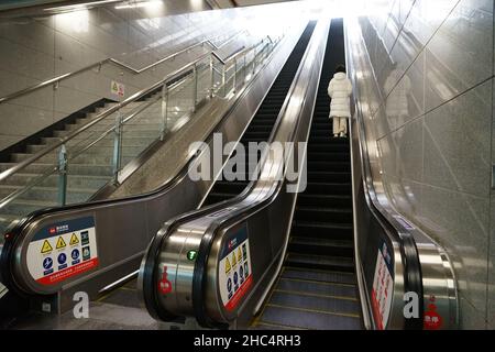 XI'AN, CHINA - DECEMBER 24, 2021 - There are few passengers leaving the subway station. On December 24, 2021, Xi'an, Shaanxi Province, China. Stock Photo