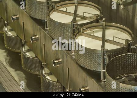 Visiting Gruyere cheese factory and museum, Switzerland Stock Photo