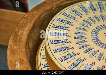 Visiting Gruyere cheese factory and museum, Switzerland Stock Photo