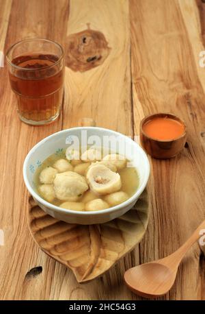 Cilok Kuah Bakso with Chilli Chopped Inside, Spicy Meatball Cilok in a Blue Bowl Stock Photo