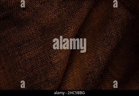 Twisted brown sackcloth texture background with selective focus Stock Photo