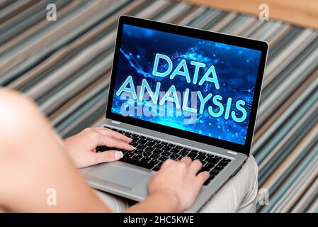 Conceptual display Data Analysis. Word for Translate numbers to Analytical Conclusion Forecasting Woman Sitting With Laptop Upper Back View Working Stock Photo