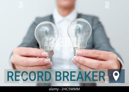 Hand writing sign Record Breaker. Word for someone or something that beats previous best result Lady in business outfit holding two lamps presenting Stock Photo