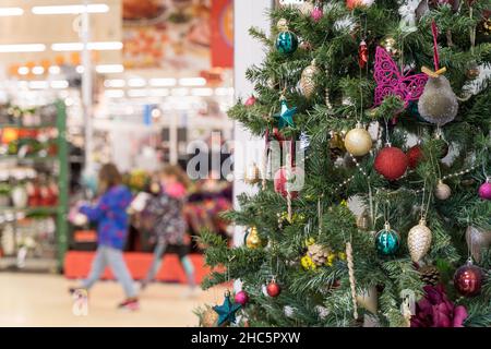 christmas tree and its decorations, stars , baulbes England UK Stock Photo