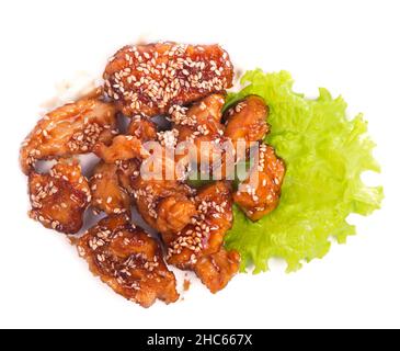 Fried chicken pieces in batter with sweet and sour sauce Stock Photo