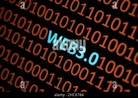 Close up of Binary codes on screen and WEB3.0 word in the middle - New Decentralized Internet - Smart Contract and Digital Ownership Stock Photo
