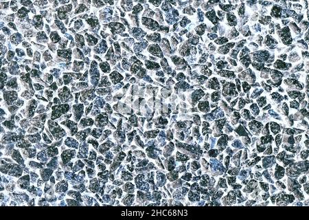 A very interesting background with pebbles highlighted on white. Stock Photo