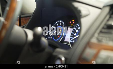 Close up for man finger pressing the car power start, stop button, transportation concept. Driver man hand pushing engine button of his car and turnin Stock Photo