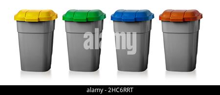 Recycling bins. Yellow, green, blue and brown dustbin for recycle plastic, paper and glass can trash isolated on white background. Container for dispo Stock Photo