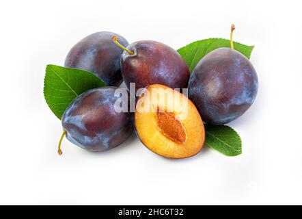 fresh plum fruits with green leaf isolated on white background Stock Photo