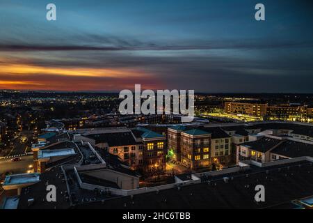 A sunset wide-angle photo  looking over Reston, VA, with the Blue Ridge Mountains in the distance. Stock Photo