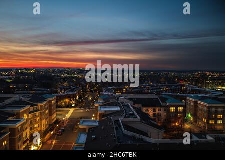 A sunset wide-angle photo  looking over Reston, VA, with the Blue Ridge Mountains in the distance. Stock Photo