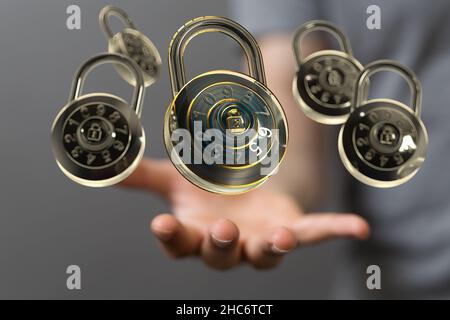 Male's hand holding illustrated padlocks - security concepts Stock Photo