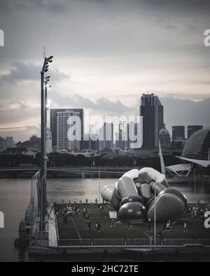A vertical grayscale shot of buildings in daylight Stock Photo - Alamy