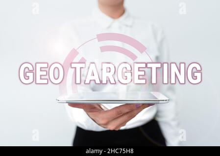Handwriting text Geo Targeting. Concept meaning Digital Ads Views IP Address Adwords Campaigns Location Presenting New Technology Ideas Discussing Stock Photo