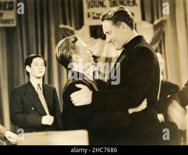 American actors Spencer Tracy and Mickey Rooney in the movie Boys Town, USA 1938 Stock Photo