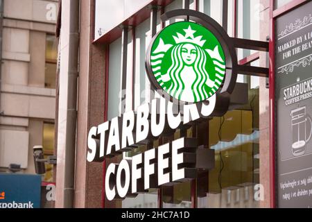 Prague, Czech Republic - December 22, 2015. Starbucks coffee sign. Starbucks Coffee is an American chain of coffee shops, founded in Seattle. Stock Photo