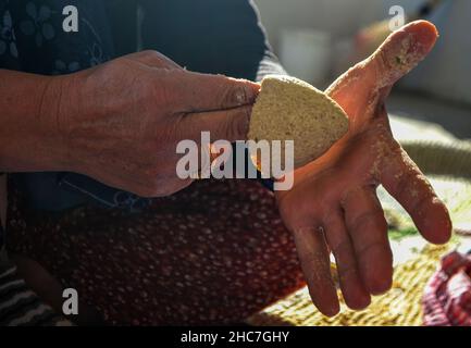 woman making kibbeh with her hand Stock Photo