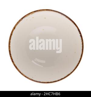 White round ceramic bowl on white reflective background. Stock Photo