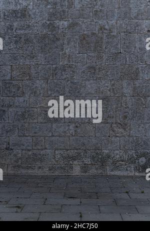 Scene of Irregular dark gray bricks dirty and wet wall background  Stock Photo
