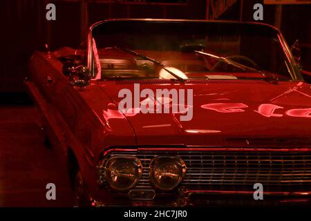Close up shot of the red vintage car Stock Photo