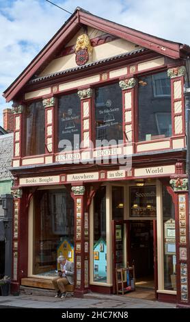 Richard Booths Book Shop with Reading Man Stock Photo