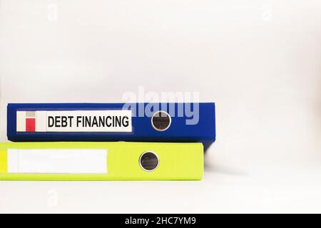Debt financing is shown on the business photo using the text Stock Photo