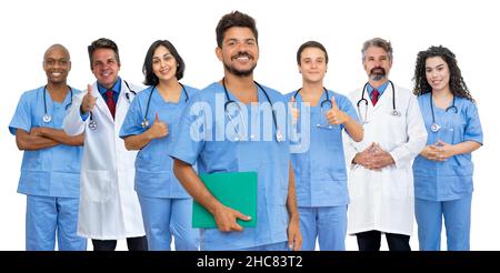 Handsome latin american male doctor with motivated medical team isolated on white background for cut out Stock Photo