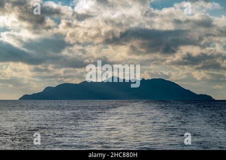 The Island of Gorgona, Italy, under a dramatic sky Stock Photo