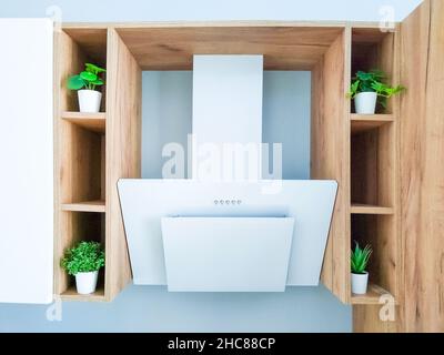 White cooker hood in kitchen scandinavian interior Stock Photo