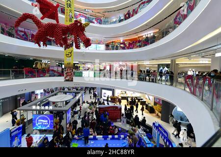 SHANGHAI, CHINA - DECEMBER 25, 2021 - Customers at the newly opened Wanda Plaza on December 25, 2021 in Shanghai, China. Stock Photo