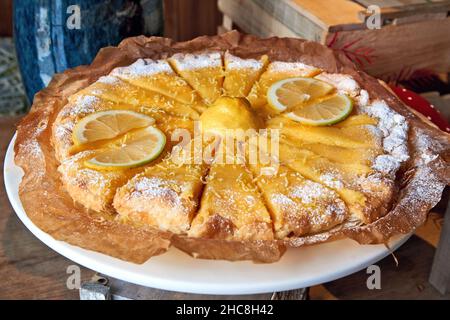Lemon Curd Pie on white plate Stock Photo