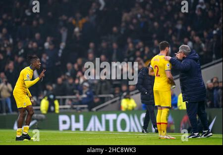 Crystal Palace's Wilfried Zaha (left) reacts after being sent off during the Premier League match at the Tottenham Hotspur Stadium, London. Picture date: Sunday December 26, 2021. Stock Photo