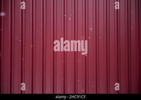 falling snowflakes on a red background Stock Photo