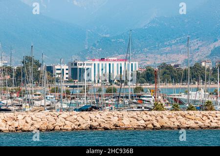 26 August 2021, Finike, Turkey: The city marina and yacht port of the city of Finike and the State Turkish Hospital Stock Photo