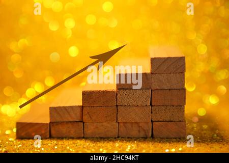 Podium for product presentation. Minimalistic staircase made of wooden cubes. A scene with geometric shapes. On a shiny yellow background. High quality photo Stock Photo