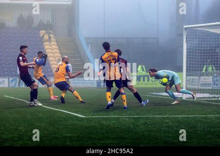 Hartlepool United's Ben Killip saves Mansfield Town's Farrend Rawson attempt on goal during the Sky Bet League Two match at the One Call Stadium, Mansfield. Picture date: Sunday December 26, 2021. Stock Photo