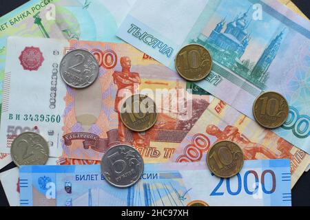 Money of Russia. Banknotes and coins. Close-up of Russian rubles of various denominations. Finance concept. Stock Photo