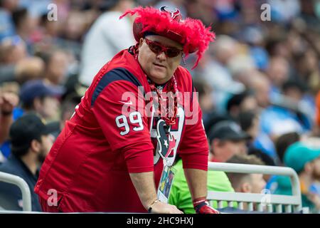 Houston, TX, USA. 26th Dec, 2021. A Houston Texans fan watches during the second quarter of an NFL football game between the Los Angeles Chargers and the Houston Texans at NRG Stadium in Houston, TX. Trask Smith/CSM/Alamy Live News Stock Photo