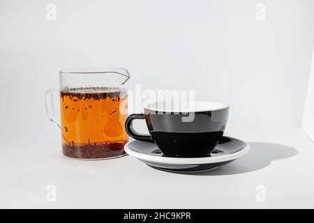 Black cup with sauce for drinking beverage Stock Photo