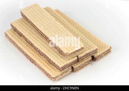 Wafers with chocolate on a white background. Neapolitan wafers.background. Stock Photo