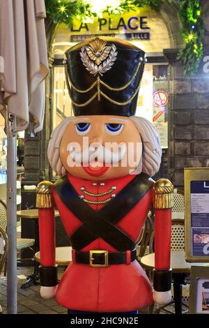 A life-size nutcracker toy soldier at Place du General de Gaulle in Lille (Nord), France Stock Photo