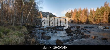 A Panoramic View of the Old Bridge of Dee at Invercauld, near Braemar, in the Scottish Highlands on a Sunny Morning in Winter Stock Photo
