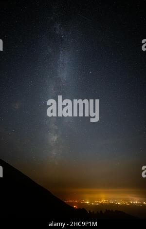 Milky way over Ruthin in the Vale of Clwyd, North Wales Stock Photo