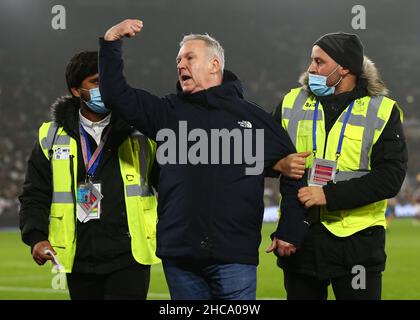 London, England, 26th December 2021.  A pitch invader is escorted off the pitch during the Premier League match at the London Stadium, London. Picture credit should read: Jacques Feeney / Sportimage Credit: Sportimage/Alamy Live News Stock Photo