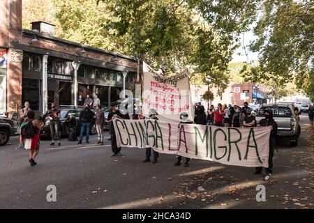 Seattle, USA. 25th Sep, 2021. Late in the day protestors at the Chinga La Migra Anti-Ice march. Stock Photo